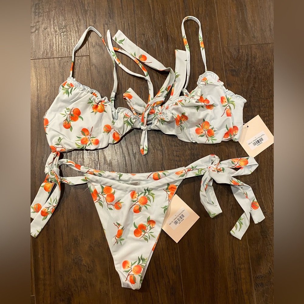 BRAND NEW Kittenish bikini. Never worn. Light blue with peaches